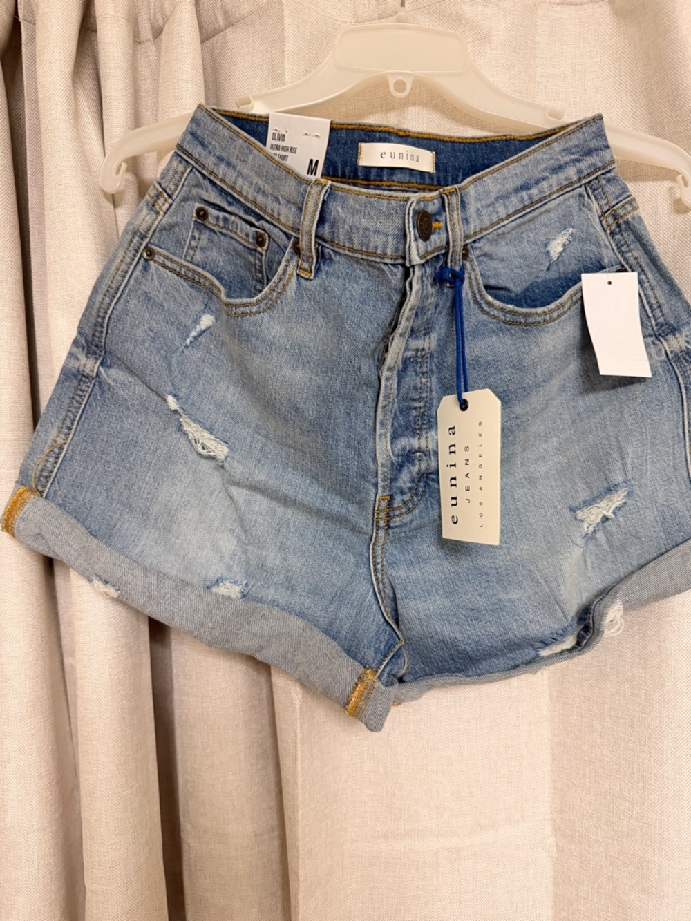 eunina Light Blue Distressed Rolled-Hem Denim Shorts